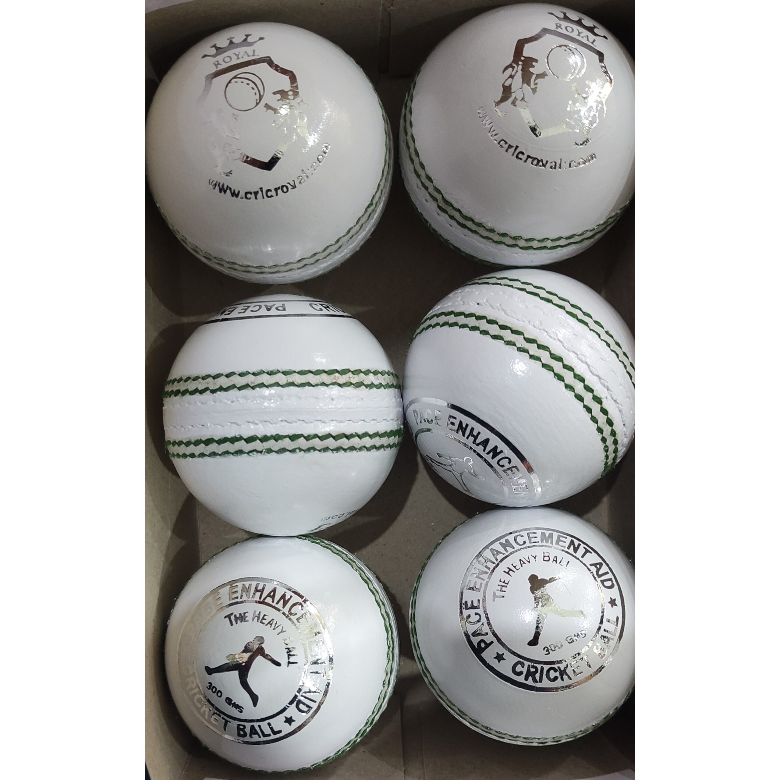 Set of six white leather cricket balls featuring a mix of Pacer Technique and Royal Cricket logos, displayed in multiple angles including front, side, and angled views; perfect for showcasing branding and build quality for both professional and training-level use