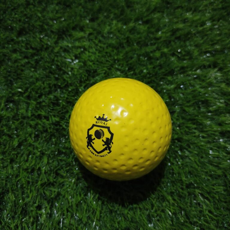 Yellow Dimple Molded Synthetic Cricket Hard Ball shown from front view with evenly spaced surface dimples for improved aerodynamics and swing performance during practice