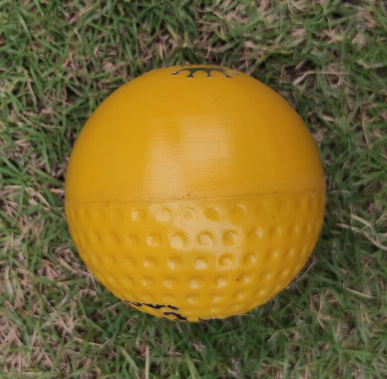 Swing Practice Ball designed with one plain side and one dimpled surface to enhance swing, ideal for training and practice sessions