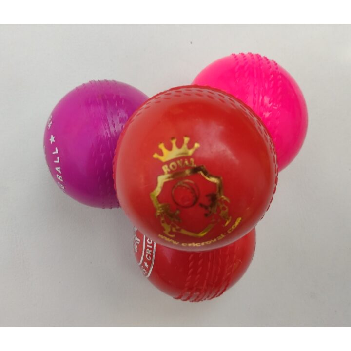 Soft Synthetic Cricket Balls in different colors; three placed at the bottom and one on top showing front view with Royal Cricket logo, designed for safe and consistent cricket practice